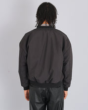 Bomber in nylon con zip dorata