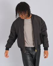 Bomber in nylon con zip dorata