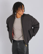 Bomber in nylon con zip dorata