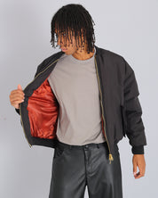 Bomber in nylon con zip dorata