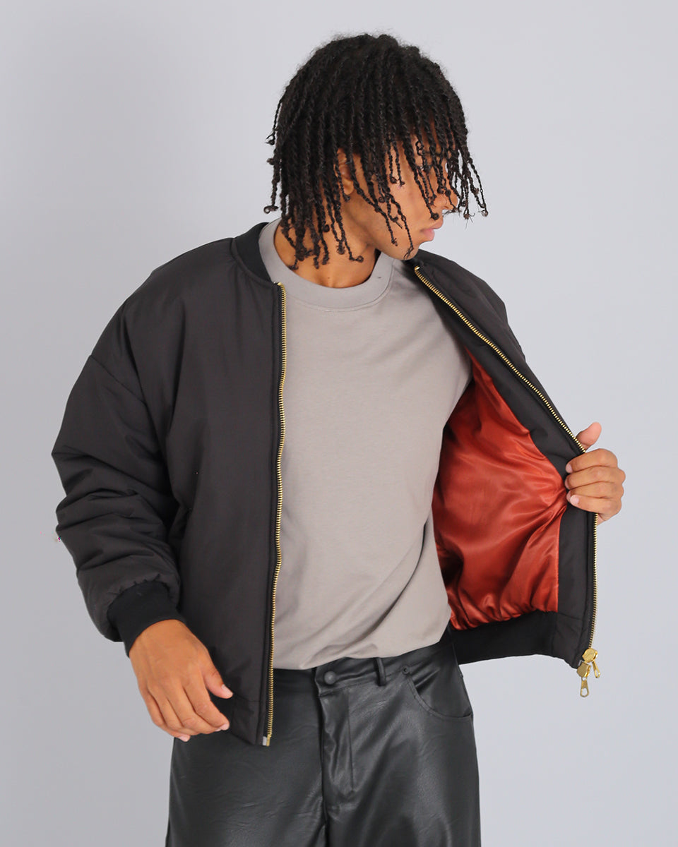 Bomber in nylon con zip dorata