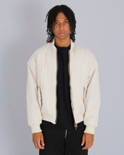 Bomber in nylon con zip dorata