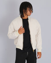 Bomber in nylon con zip dorata